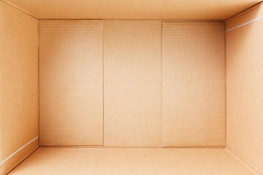 Empty cardboard box, inside view. Empty space for cargo, parcel and gift.