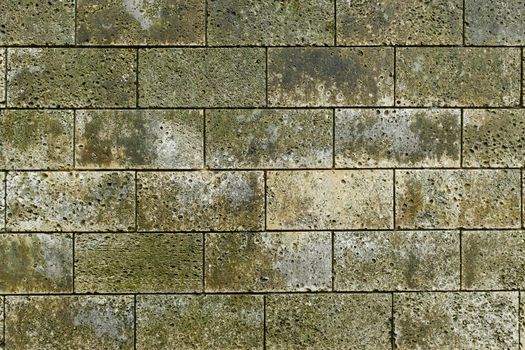 The texture of stone walls. Moss brick texture.