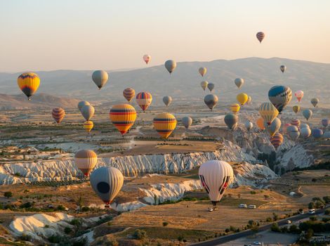 hot air balloons over the plateau in Cappadocia