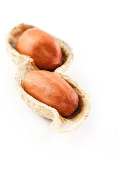 Peanuts isolated on white background. Peeled Peel and Scarlup Macro Peanuts.