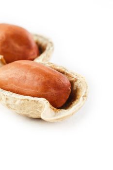 Peanuts isolated on white background. Peeled Peel and Scarlup Macro Peanuts.