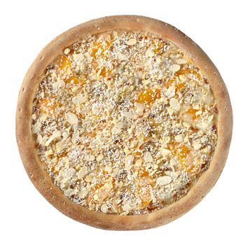 Top view of sweet pizza with condensed milk, ripe banana and peach sprinkled with almond and coconut shavings isolated on white background. Kids desserts concept