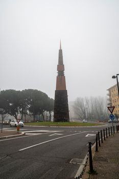 terni,italy january 17 2022:terni obelisk by Arnaldo Pomodoro with fog