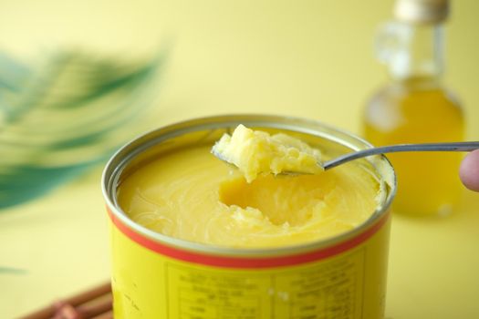 homemade ghee in container on a table