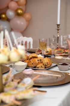 Elegant sweet table with sweets and decoration baby shower party celebration baby girl