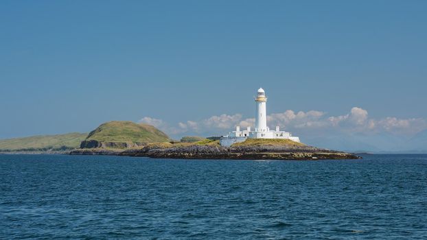 Lismore lighthouse on Eilean Musdile in the Firth of Lorne at the entrance to Loch Linnhe, Hebrides, Scotland, UK