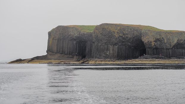 Fingals Cave and hexagonal volcanic basalt rock columns, Isle of Staffa, Hebrides, Scotland, UK