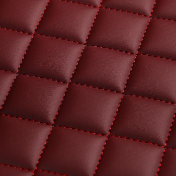 Texture of red leather background with square pattern and stitch, macro