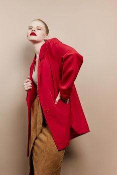 glamorous woman red lips fashion jacket studio model unaltered. High quality photo