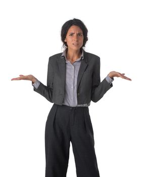 Pretty business woman holding her hands out saying that she does not know isolated over white background. Have no idea concept
