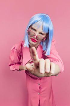 woman bright makeup fashion sunglasses pink background. High quality photo