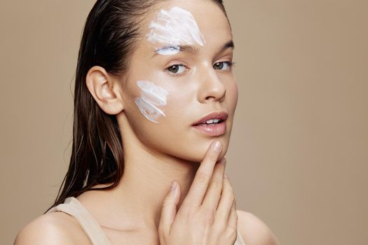 woman skin care by using white mask on the face Youth and Skin Care Concept. High quality photo