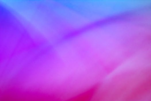 Purple lilac crimson abstract background. Beautifully blurred wavy festive backdrop.