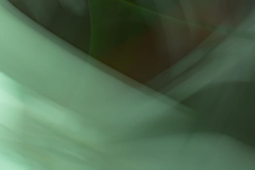 Abstract background banner in dark green colors. Photo effect, light refraction. Line wave gradient.