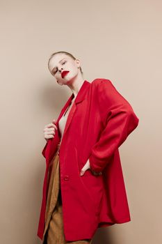 pretty woman red lips fashion jacket studio model unaltered. High quality photo