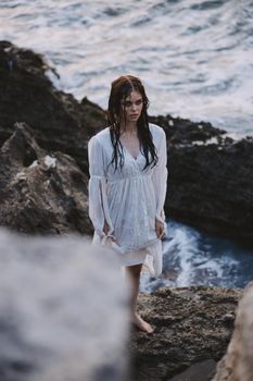 woman traveler enjoying for view of the beautiful sea on her holiday relax unaltered. High quality photo