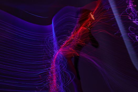 Positive young woman neon lines posing model glamor color background unaltered. High quality photo