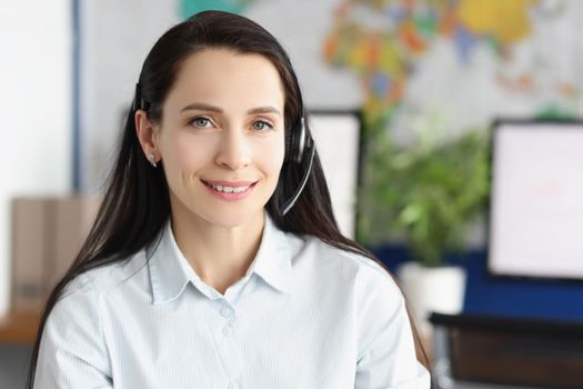 Portrait of lady support service worker wear headset with microphone for voice connection. Operator on line in office. Customer service, consultant concept