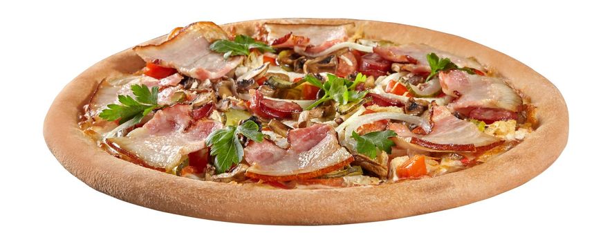 Closeup of delicious country style pizza with chicken fillet, slices of bacon and hunting sausages garnished with pickled cucumbers, mushrooms, onions, tomatoes and greens on creamy cheese sauce