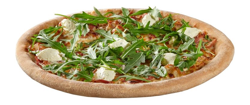 Closeup of delicious pizza with ham slices under browned melted mozzarella, piquant cream cheese mixed with spicy herbs and fresh green arugula isolated on white background. Italian cuisine