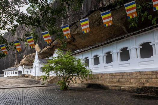 Sri Lanka. Dambulla Cave Temple. Panoramic view from outside with flags. High quality photo