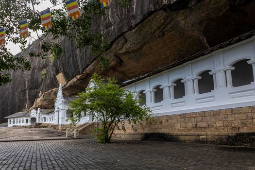 Sri Lanka. Dambulla Cave Temple. Panoramic view from outside with flags. High quality photo