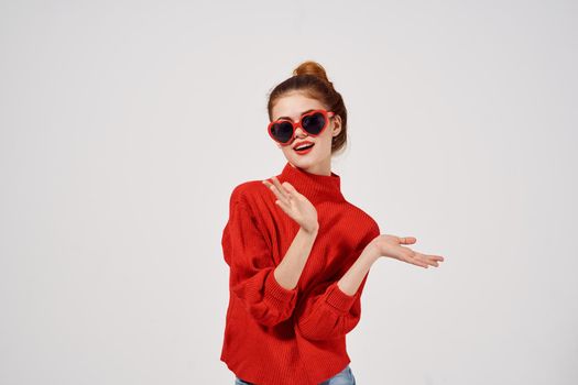 fashionable woman in a red sweater attractive look. High quality photo
