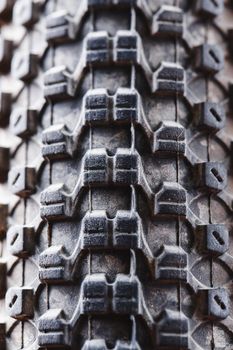 Bicycle wheel and tire close up on tread abstract. Macro.