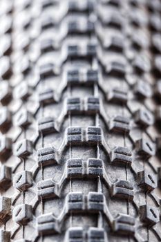 Bicycle wheel and tire close up on tread abstract. Macro.