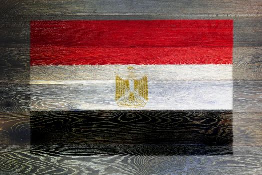 An Egypt flag on rustic old wood surface background