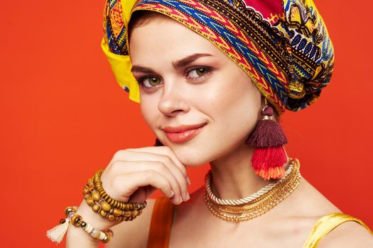 pretty woman ethnicity multicolored headscarf makeup glamor Studio Model. High quality photo