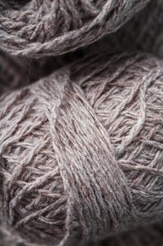 Light brown yarn made of natural sheep wool. Needlework