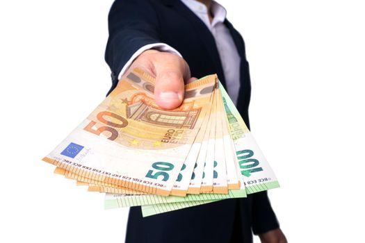 Man holding euro banknotes or cash money isolated on white background. Businessman giving money. High quality photo