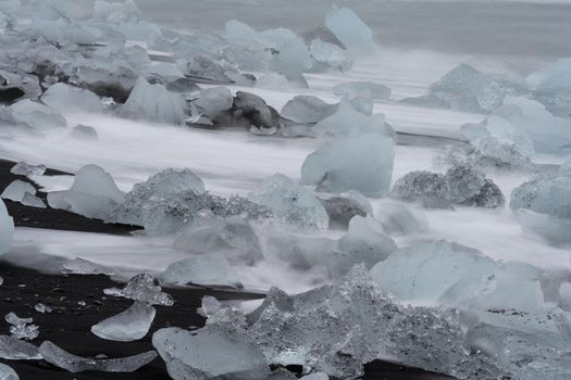 Long exposure of icebergs over Jokulsarlon black diamong beach