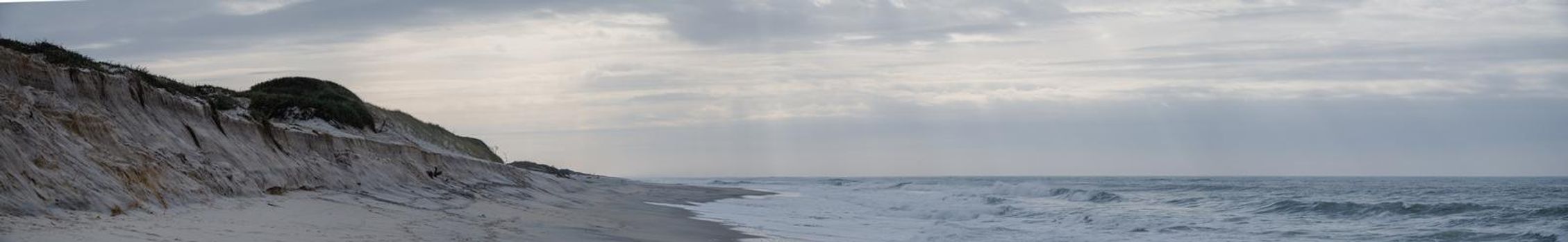 Dune with landslides after the storm surge on Torrao do Lameiro Beach in Ovar, Portugal.