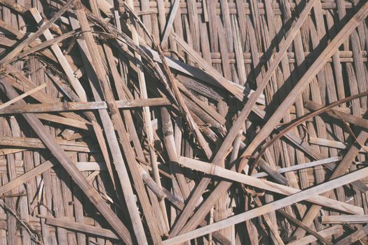 Real nature abstract background. Bamboo straws weaving texture mat, light gray yellow brown beige colour vintage effect. Calm warm simple life style mood, minimalism, design wallpaper backdrop.