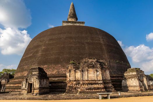 Sri Lanka. The ancient city of Polonnaruwa. Rankoth Vehera Stupa. Taken close-up on a sunny day with a clear blue sky. High quality photo