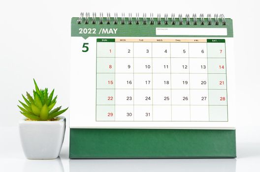 The May 2022 desk calendar on white background.