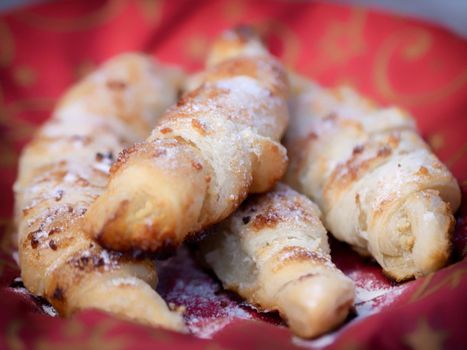 homemade baking. almond croissants on a red napkin