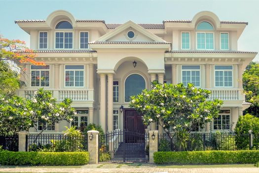 One beautiful three-story house with  trees, and landscape design in the summer. An Vien. Nha trang. Vietna.