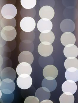 Abstract bokeh lights with soft light background