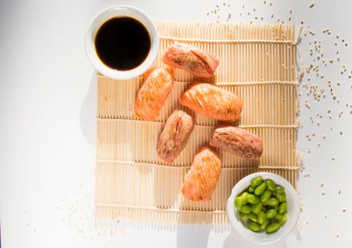 Salmon and tuna fish nigiri set on the white background, sushi set