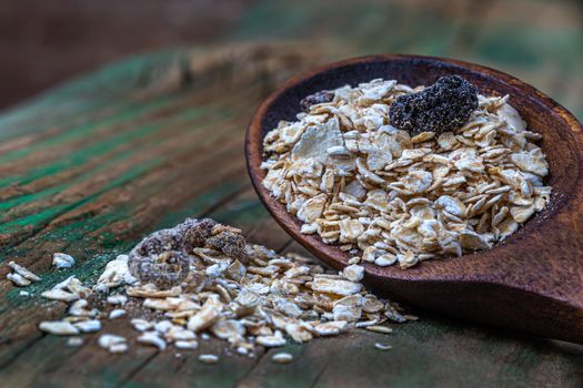 cereals in close-up in a wooden spoon