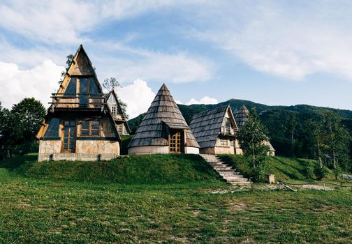 Triangular and cone-shaped houses in the north of Montenegro. High quality photo
