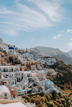 Oia Santorini Greece famous with romantic and beautiful sunsets. Oia village in Santorini island.Greece.