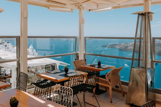 Romantic restaurant. Greece, Santorini, restaurant above the volcano