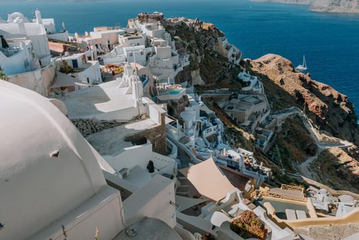 Oia Santorini Greece famous with romantic and beautiful sunsets. Oia village in Santorini island.Greece.