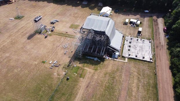 workers build a concert stage. Concept High-rise works. metal designs.