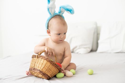 Cute little boy with bunny ears, Easter.