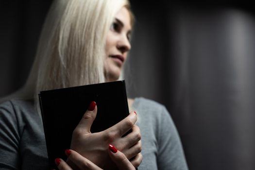 Woman reading the Holy Bible, Reading a book.